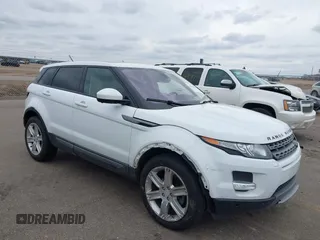 2015 Land Rover Range Rover Evoque Pure Premium z VIN SALVR2BGXFH051171, wystawiony jako IAAI lot #41962814 z przebiegiem 170 001 mil mil oraz . Historia ofert i sprzedaży dostępna na DreamBid. Obrazek 1.