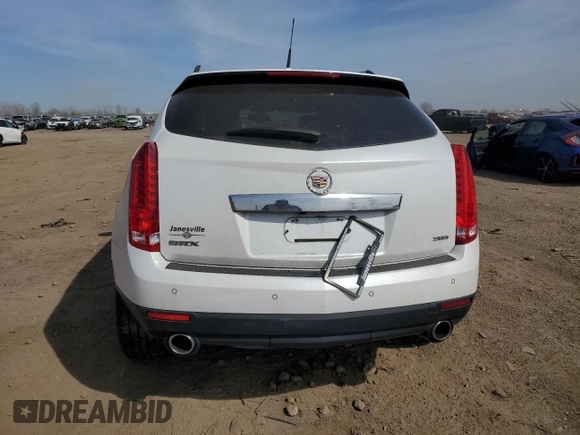 2013 Cadillac SRX Performance Collection z VIN 3GYFNDE35DS585852, wystawiony jako Copart lot #53179435 z przebiegiem 146 814 mil mil oraz Szkoda całkowita • Salvage title. Historia ofert i sprzedaży dostępna na DreamBid. Obrazek 6.