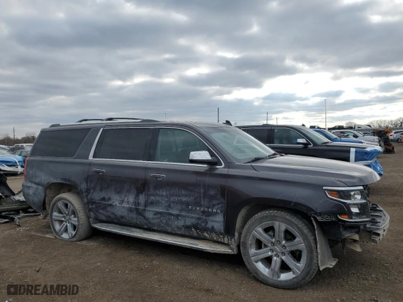 2017 Chevrolet Suburban Premier with VIN 1GNSKJKCXHR403076, listed as a Copart auction lot 46606025 with 99,481 mi miles and Salvage Title. Bid and sale history available at carsss.com. Image 4.