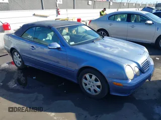2000 Mercedes-Benz CLK with VIN WDBLK65G8YT048919, listed as a IAAI auction lot 41513203 with 124,453 mi miles and . Bid and sale history available at carsss.com. Image 1.