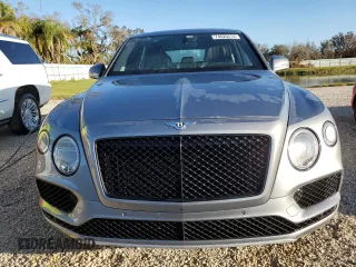 2019 Bentley Bentayga V8 z VIN SJAAM2ZV4KC024727, wystawiony jako Copart lot #74625214 z przebiegiem Nie podano mil oraz Nie do naprawy • Non repairable. Historia ofert i sprzedaży dostępna na DreamBid. Obrazek 5.
