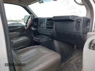 2014 Chevrolet Express Cargo Van with VIN 1GCSGAFX2E1121841, listed as a IAAI auction lot 42028712 with 164,768 mi miles. Bid and sale history available at carsss.com. Image 5.
