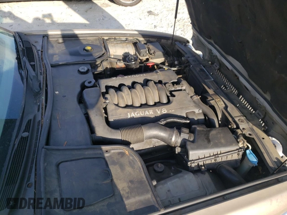 1998 Jaguar XJ with VIN SAJHX1242WC845736, listed as a Copart auction lot 82006044 with 188,785 mi miles and Salvage title. Bid and sale history available at DreamBid. Image 11.