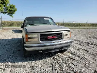 1999 GMC Yukon with VIN 1GKEK13R5XJ725991, listed as a Copart auction lot 71176784 with 245,481 mi miles and Clean Title. Bid and sale history available at carsss.com. Image 11.