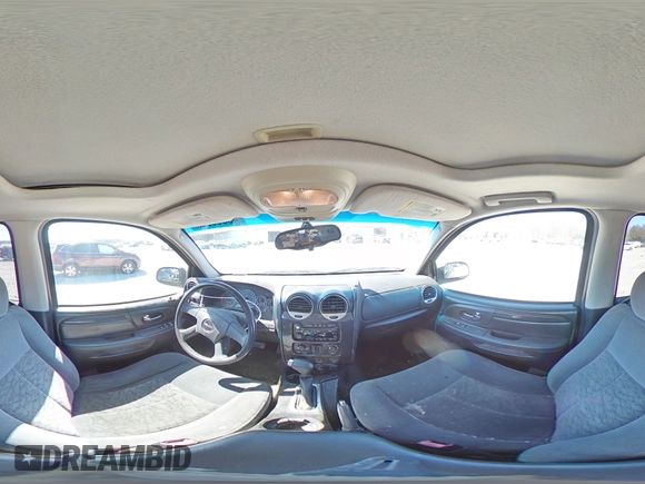 2005 GMC Envoy SLE с VIN 1GKDS13S852264341, выставлен на аукционе Copart как лот 49835015 с пробегом 178 401 миль миль и Списание • Salvage title. История ставок и продаж доступна на DreamBid. Изображение 14.
