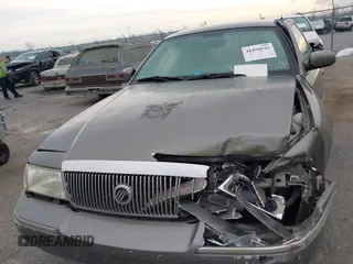 2004 Mercury Grand Marquis LS Premium z VIN 2MEHM75W64X654827, wystawiony jako IAAI lot #41890046 z przebiegiem Nie podano mil oraz . Historia ofert i sprzedaży dostępna na DreamBid. Obrazek 10.