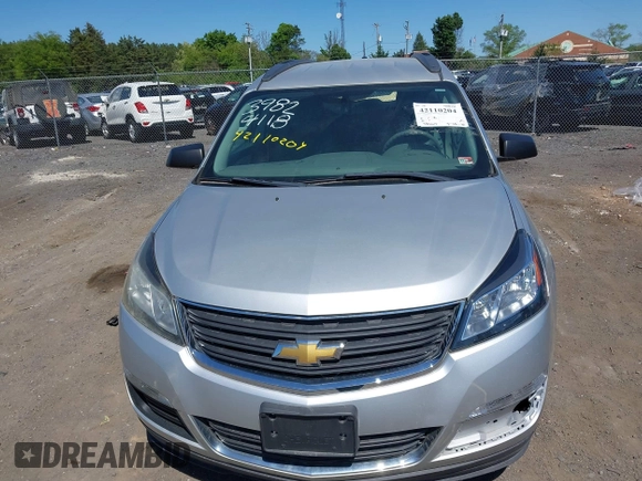 2017 Chevrolet Traverse LS with VIN 1GNKRFKD0HJ161222, listed as a IAAI auction lot 42110204 with 58,663 mi miles and . Bid and sale history available at DreamBid. Image 12.