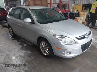 2009 Hyundai Elantra Touring z VIN KMHDC86E59U041672, wystawiony jako IAAI lot #42360756 z przebiegiem 201 551 mil mil oraz . Historia ofert i sprzedaży dostępna na DreamBid. Obrazek 1.