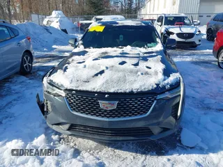 2022 Cadillac CT4 Premium Luxury z VIN 1G6DF5RK9N0118849, wystawiony jako IAAI lot #41587644 z przebiegiem 84 367 mil mil oraz . Historia ofert i sprzedaży dostępna na DreamBid. Obrazek 12.