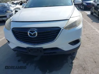 2015 Mazda CX-9 Sport with VIN JM3TB2BAXF0453244, listed as a IAAI auction lot 41905847 with 128,764 mi miles and . Bid and sale history available at carsss.com. Image 12.