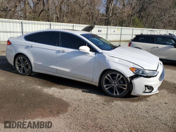 2019 Ford Fusion Titanium with VIN 3FA6P0K99KR217217, listed as a Copart auction lot 47590015 with 105,177 mi miles and Salvage Title. Bid and sale history available at carsss.com. Image 4.