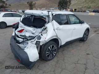 2019 Nissan Kicks S with VIN 3N1CP5CU2KL559112, listed as a IAAI auction lot 41528293 with 97,255 mi miles. Bid and sale history available at carsss.com. Image 4.