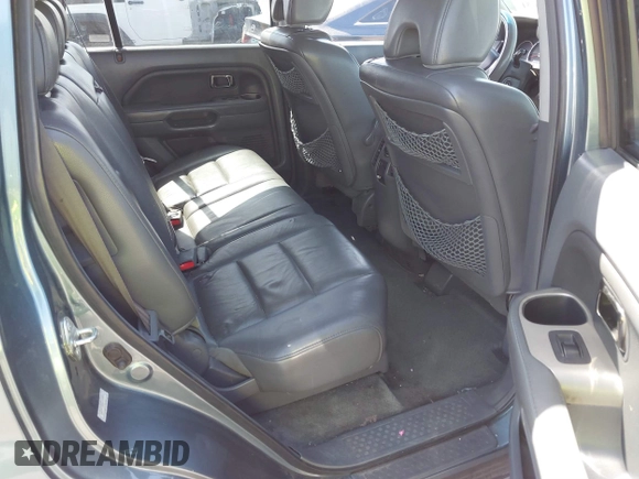 2006 Honda Pilot EX-L with VIN 2HKYF18536H548948, listed as a IAAI auction lot 36572651 with 242,758 mi miles and . Bid and sale history available at DreamBid. Image 8.