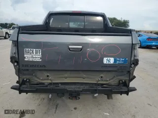 2012 Honda Ridgeline RTS with VIN 5FPYK1F46CB460256, listed as a Copart auction lot 70879644 with 136,217 mi miles and Salvage Title. Bid and sale history available at carsss.com. Image 6.