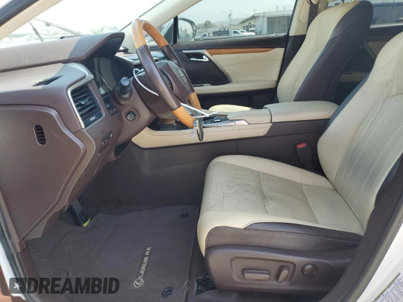 2019 Lexus RX 450h with VIN 2T2BGMCA0KC041135, listed as a Copart auction lot 58092455 with 97,599 mi miles and Salvage title. Bid and sale history available at DreamBid. Image 7.