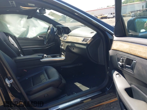 2015 Mercedes-Benz E 350 Sport with VIN WDDHF5KB5FB089242, listed as a IAAI auction lot 41823554 with 154,153 mi miles and . Bid and sale history available at DreamBid. Image 13.