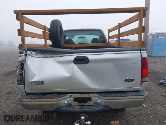 1999 Ford F-150 with VIN 2FTZF1828XCA85643, listed as a IAAI auction lot 41347113 with 173,813 mi miles and . Bid and sale history available at DreamBid. Image 16.