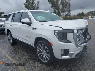 2021 GMC Yukon Denali with VIN 1GKS2DKL8MR125626, listed as a IAAI auction lot 41796439 with 63,001 mi miles. Bid and sale history available at carsss.com. Image 1.
