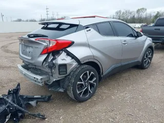 2019 Toyota C-HR XLE with VIN NMTKHMBX0KR082023, listed as a IAAI auction lot 41606867 with 52,814 mi miles. Bid and sale history available at carsss.com. Image 4.