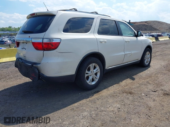 2012 Dodge Durango SXT z VIN 1C4RDJAG0CC294998, wystawiony jako IAAI lot #42230396 z przebiegiem 62 963 mil mil oraz . Historia ofert i sprzedaży dostępna na DreamBid. Obrazek 4.