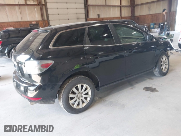 2010 Mazda CX-7 Sport with VIN JM3ER2WMXA0305807, listed as a IAAI auction lot 42022020 with 200,905 mi miles and . Bid and sale history available at DreamBid. Image 4.
