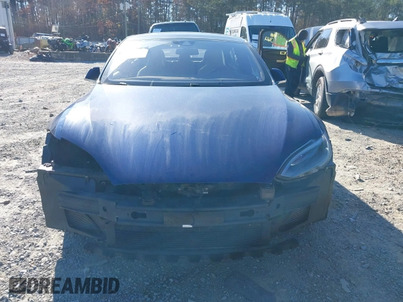 2016 Tesla Model S 90D with VIN 5YJSA1E25GF144614, listed as a IAAI auction lot 40941311 with 83,587 mi miles and . Bid and sale history available at DreamBid. Image 11.