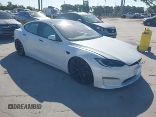 2023 Tesla Model S with VIN 5YJSA1E57PF501270, listed as a IAAI auction lot 42068893 with Not provided miles and . Bid and sale history available at DreamBid. Image 1.