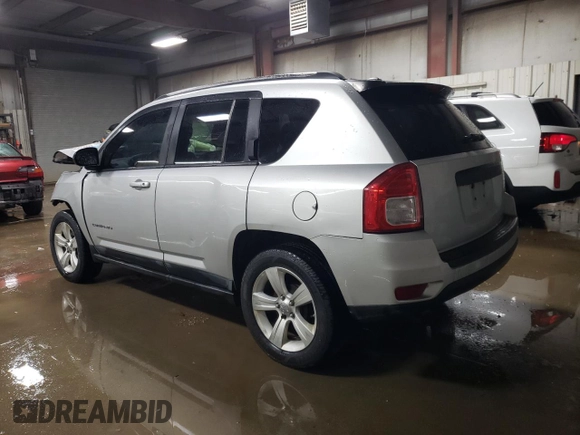 2011 Jeep Compass with VIN 1J4NT1FB7BD272109, listed as a Copart auction lot 86604064 with 0 mi miles and Salvage Title. Bid and sale history available at carsss.com. Image 2.