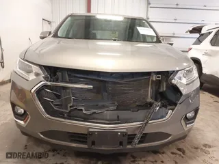 2018 Chevrolet Traverse Premier with VIN 1GNEVJKW0JJ165144, listed as a IAAI auction lot 41129951 with 137,593 mi miles. Bid and sale history available at carsss.com. Image 6.