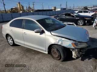 2011 Volkswagen Jetta SE with VIN 3VWDZ7AJXBM326103, listed as a Copart auction lot 57885185 with 149,064 mi miles and Salvage title. Bid and sale history available at DreamBid. Image 4.