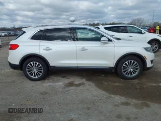 2016 Lincoln MKX Select with VIN 2LMTJ6KR3GBL61112, listed as a IAAI auction lot 42031424 with 130,321 mi miles. Bid and sale history available at carsss.com. Image 13.