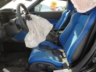 2023 Nissan Z Performance с VIN JN1BZ4BH6PM311169, выставлен на аукционе Copart как лот 87867905 с пробегом 27 203 миль миль и Списание • Salvage title. История ставок и продаж доступна на DreamBid. Изображение 7.