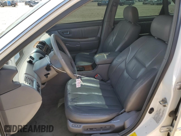 2001 Toyota Avalon XL with VIN 4T1BF28B11U171919, listed as a Copart auction lot 55977855 with 189,840 mi miles and Salvage Title. Bid and sale history available at DreamBid. Image 7.