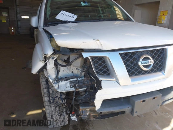 2014 Nissan Frontier SV with VIN 1N6AD0EV4EN736220, listed as a IAAI auction lot 41241823 with 91,789 mi miles and . Bid and sale history available at DreamBid. Image 6.