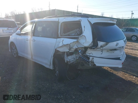 2014 Toyota Sienna SE with VIN 5TDXK3DC1ES503751, listed as a IAAI auction lot 41709975 with 229,771 mi miles and . Bid and sale history available at DreamBid. Image 3.