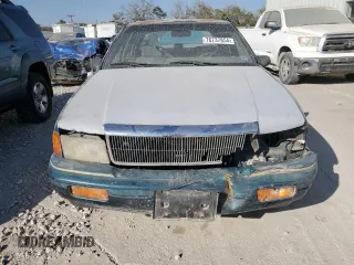 1995 Plymouth Acclaim z VIN 3P3AA4639ST552970, wystawiony jako Copart lot #76737854 z przebiegiem 113 119 mil mil oraz Szkody całkowita. Historia ofert i sprzedaży dostępna na DreamBid. Obrazek 5.