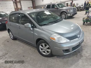 2009 Nissan Versa 1.8 SL with VIN 3N1BC13E99L409551, listed as a IAAI auction lot 41628375 with 214,873 mi miles. Bid and sale history available at carsss.com. Image 1.