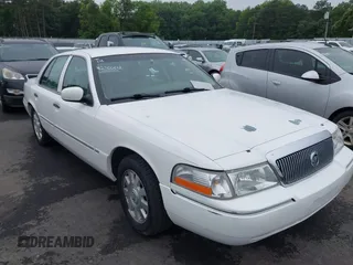 2005 Mercury Grand Marquis LS Premium z VIN 2MEFM75W65X669224, wystawiony jako IAAI lot #42360612 z przebiegiem 99 687 mil mil oraz . Historia ofert i sprzedaży dostępna na DreamBid. Obrazek 1.
