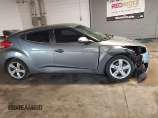 2013 Hyundai Veloster w/Gray Int with VIN KMHTC6AD4DU117924, listed as a IAAI auction lot 41339465 with 156,004 mi miles. Bid and sale history available at carsss.com. Image 14.