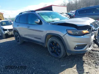 2019 Jeep Cherokee Latitude Plus with VIN 1C4PJMLB0KD320947, listed as a IAAI auction lot 41225801 with 64,537 mi miles. Bid and sale history available at carsss.com. Image 1.