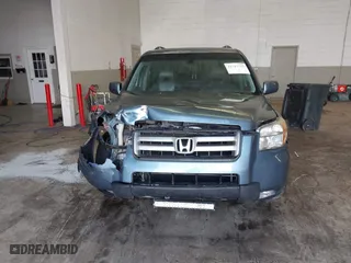2007 Honda Pilot EX-L with VIN 2HKYF18767H514926, listed as a IAAI auction lot 41717715 with 129,927 mi miles. Bid and sale history available at carsss.com. Image 13.