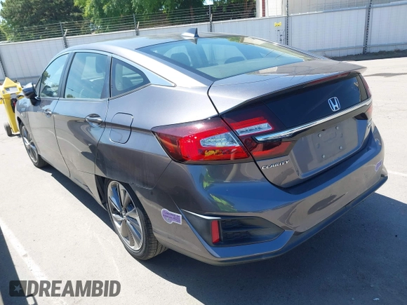 2018 Honda Clarity Touring z VIN JHMZC5F33JC021811, wystawiony jako IAAI lot #42272808 z przebiegiem 82 414 mil mil oraz . Historia ofert i sprzedaży dostępna na DreamBid. Obrazek 3.