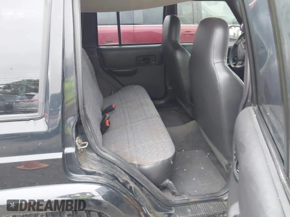 2000 Jeep Cherokee with VIN 1J4FF48S4YL145195, listed as a IAAI auction lot 42302654 with 173,764 mi miles and . Bid and sale history available at DreamBid. Image 8.