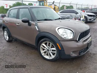2014 MINI Countryman S z VIN WMWZC5C54EWM17898, wystawiony jako IAAI lot #42343469 z przebiegiem 112 773 mil mil oraz . Historia ofert i sprzedaży dostępna na DreamBid. Obrazek 1.