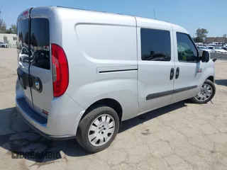 2021 Ram ProMaster City Cargo Tradesman SLT with VIN ZFBHRFBB6M6T38499, listed as a IAAI auction lot 42190007 with 73,186 mi miles. Bid and sale history available at carsss.com. Image 4.