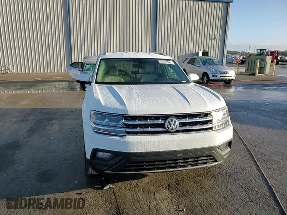 2019 Volkswagen Atlas SE with VIN 1V2DP2CA9KC595931, listed as a Copart auction lot 84701994 with 77,000 mi miles and Salvage title. Bid and sale history available at DreamBid. Image 11.