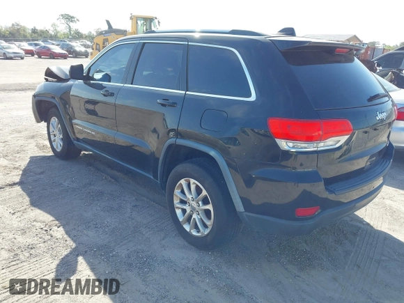 2014 Jeep Grand Cherokee Laredo with VIN 1C4RJEAG7EC263590, listed as a IAAI auction lot 41699106 with 136,581 mi miles and . Bid and sale history available at DreamBid. Image 3.