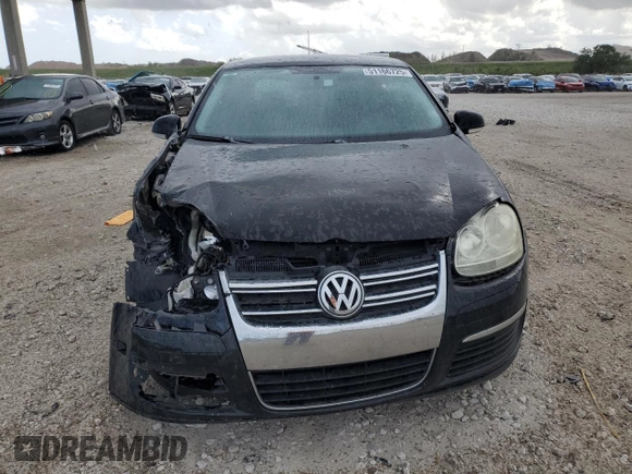 2009 Volkswagen Jetta S z VIN 3VWJM71K49M094862, wystawiony jako Copart lot #51166725 z przebiegiem 121 849 mil mil oraz Szkoda całkowita • Salvage title. Historia ofert i sprzedaży dostępna na DreamBid. Obrazek 5.