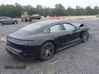 2022 Porsche Taycan 4S z VIN WP0AB2Y12NSA43485, wystawiony jako IAAI lot #42339411 z przebiegiem 16 371 mil mil oraz . Historia ofert i sprzedaży dostępna na DreamBid. Obrazek 4.