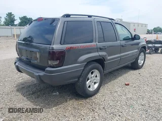 2004 Jeep Grand Cherokee Laredo with VIN 1J4GW48S44C352538, listed as a IAAI auction lot 42765905 with 249,220 mi miles and . Bid and sale history available at DreamBid. Image 4.